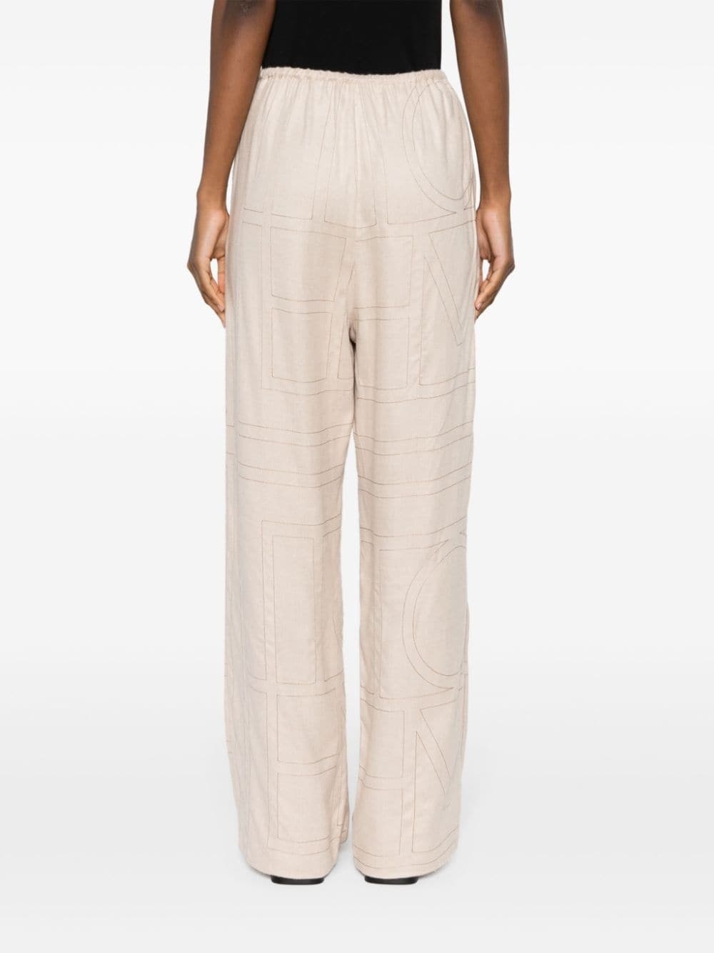 stich-embellished tapered trousers - 4