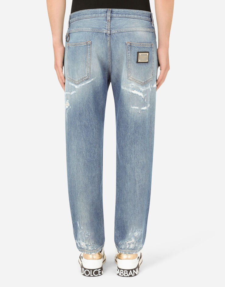 Loose light blue jeans with rips - 2