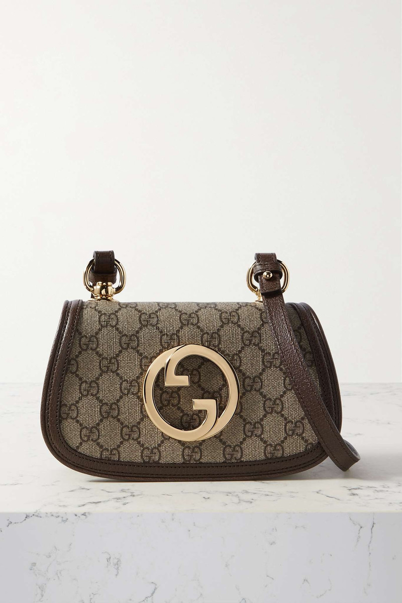 Blondie textured leather-trimmed printed coated-canvas shoulder bag 1