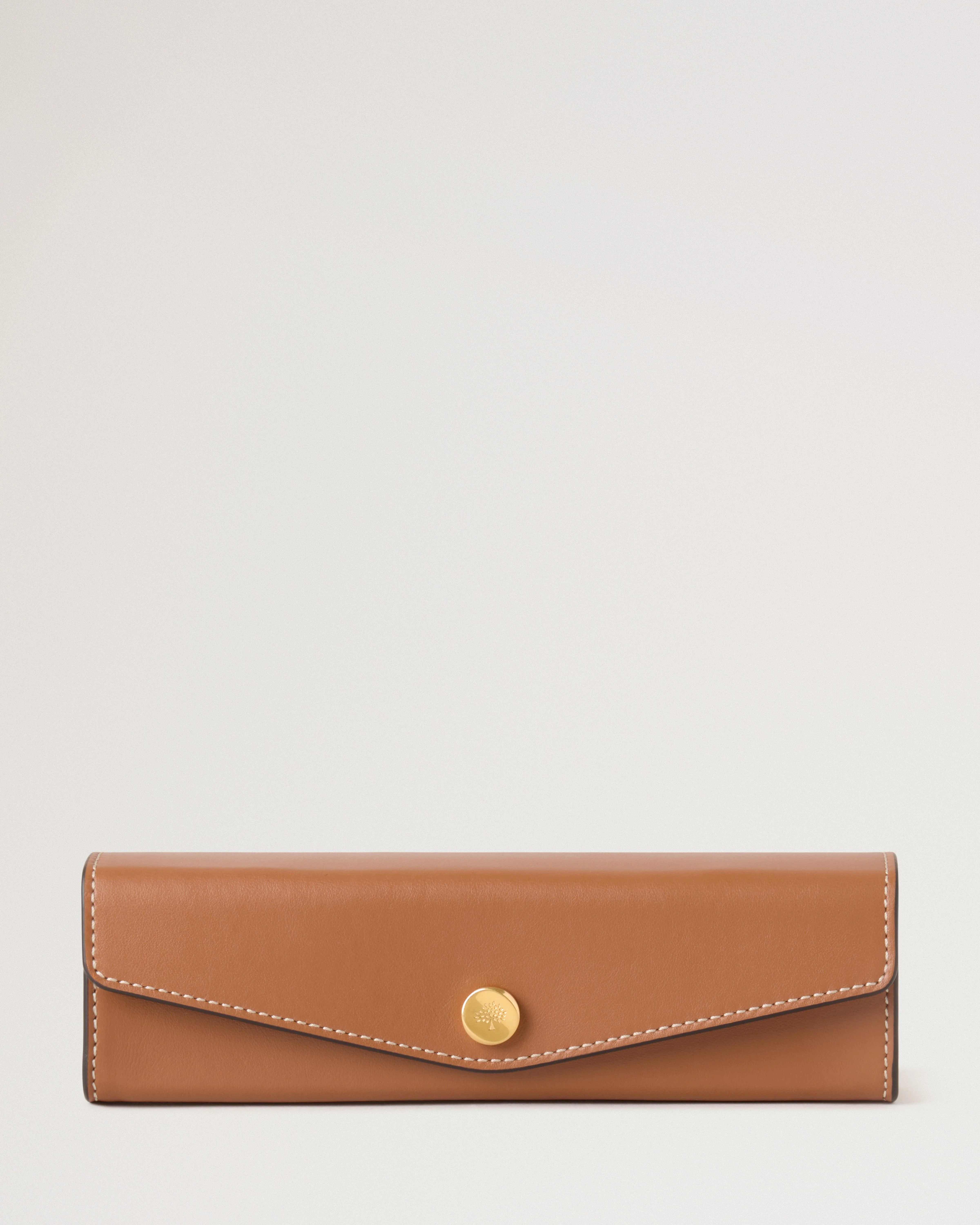 Dominoes Set & Case
Vintage Oak Nappa - 1