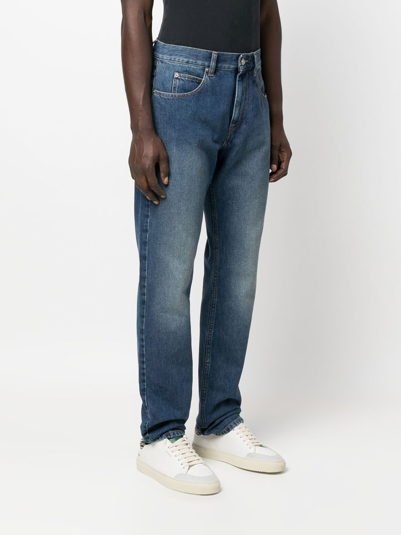 straight-leg mid-wash jeans 3