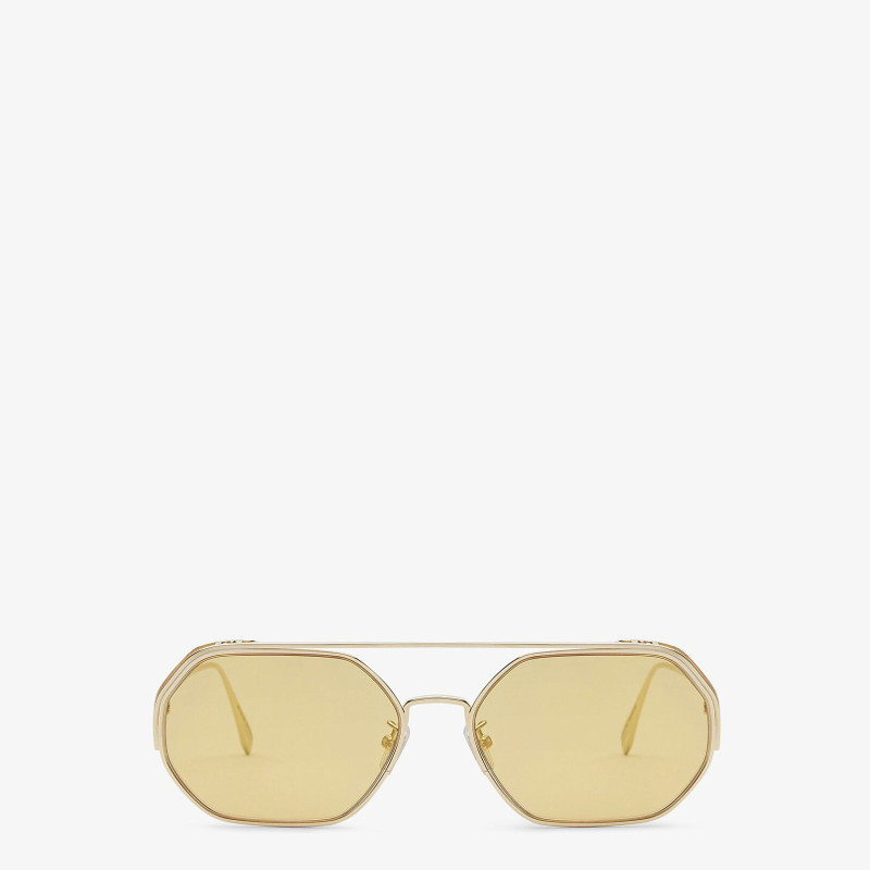 Sunglasses with gold-mirrored lenses 1