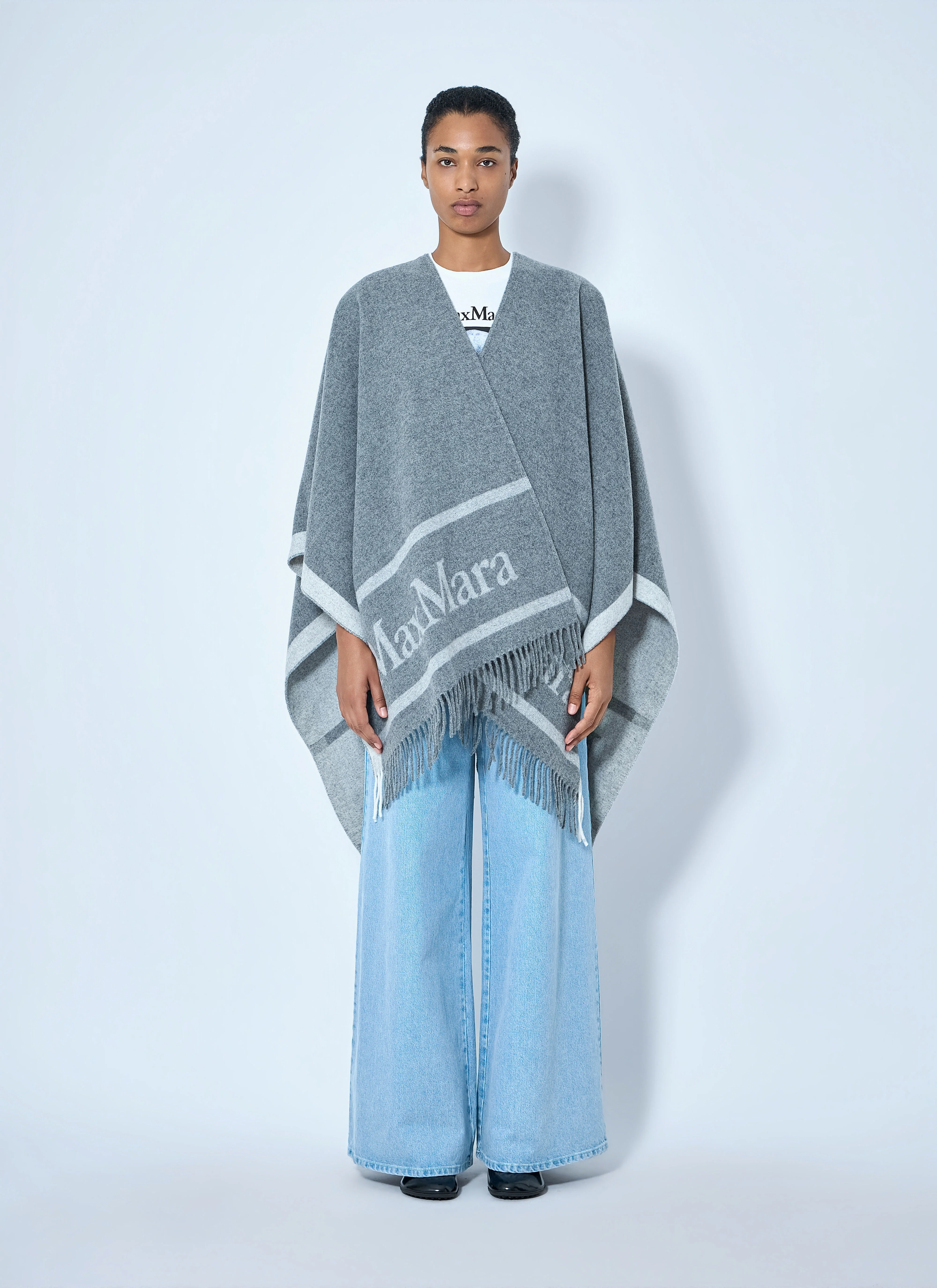 Woven Fringe Poncho - 1