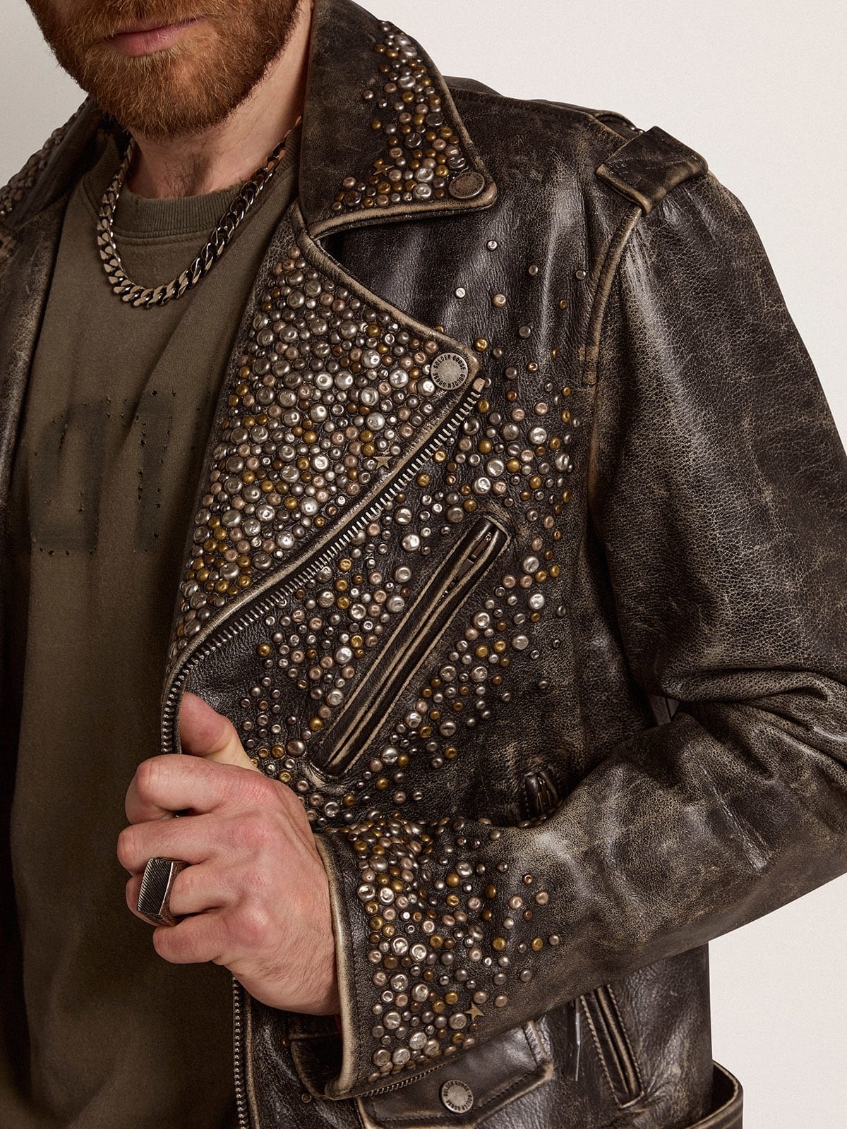 Men's leather biker jacket with hammered studs and adhesive tape - 2