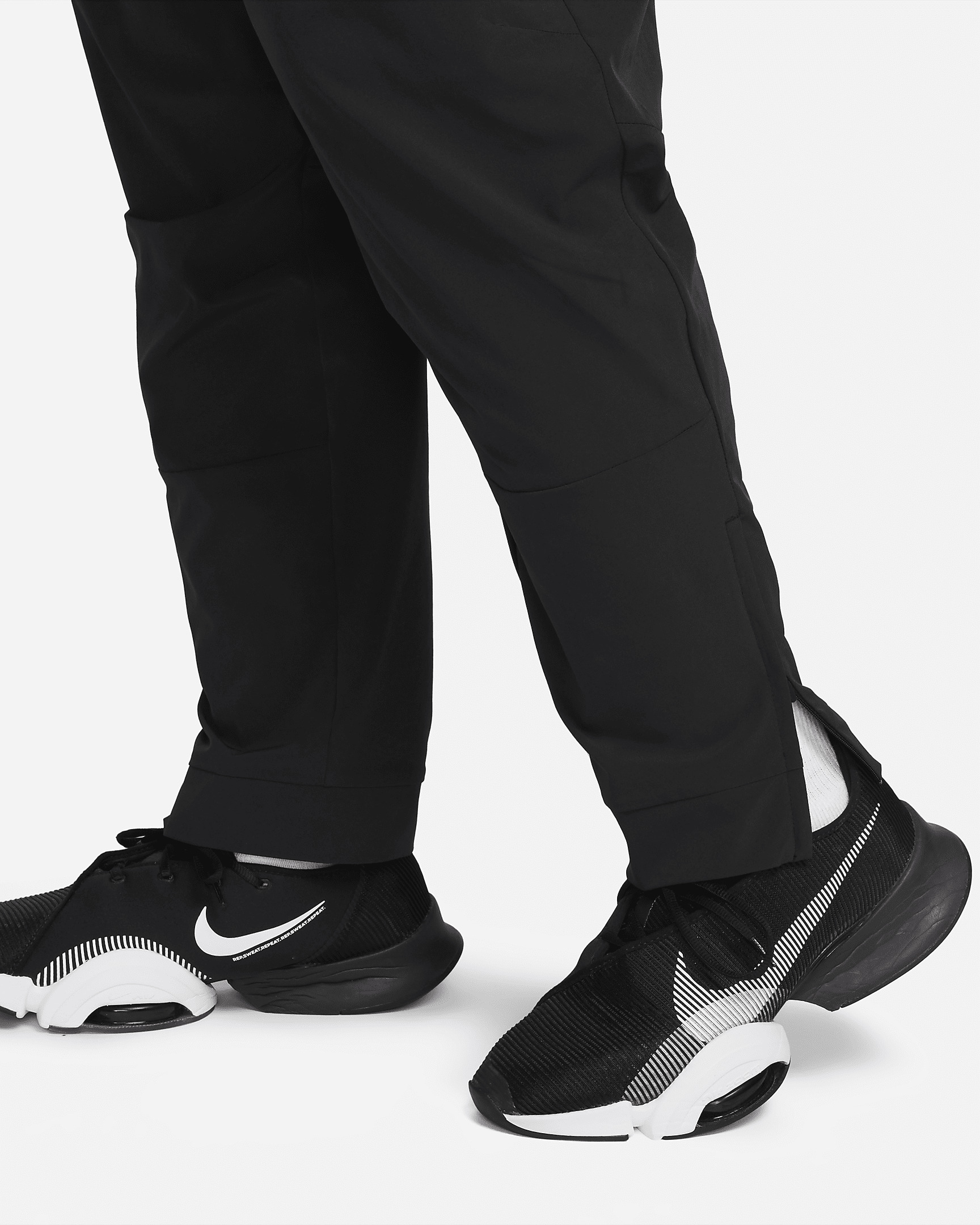 Nike Unlimited Men's Dri-FIT Zippered Cuff Versatile Pants - 12