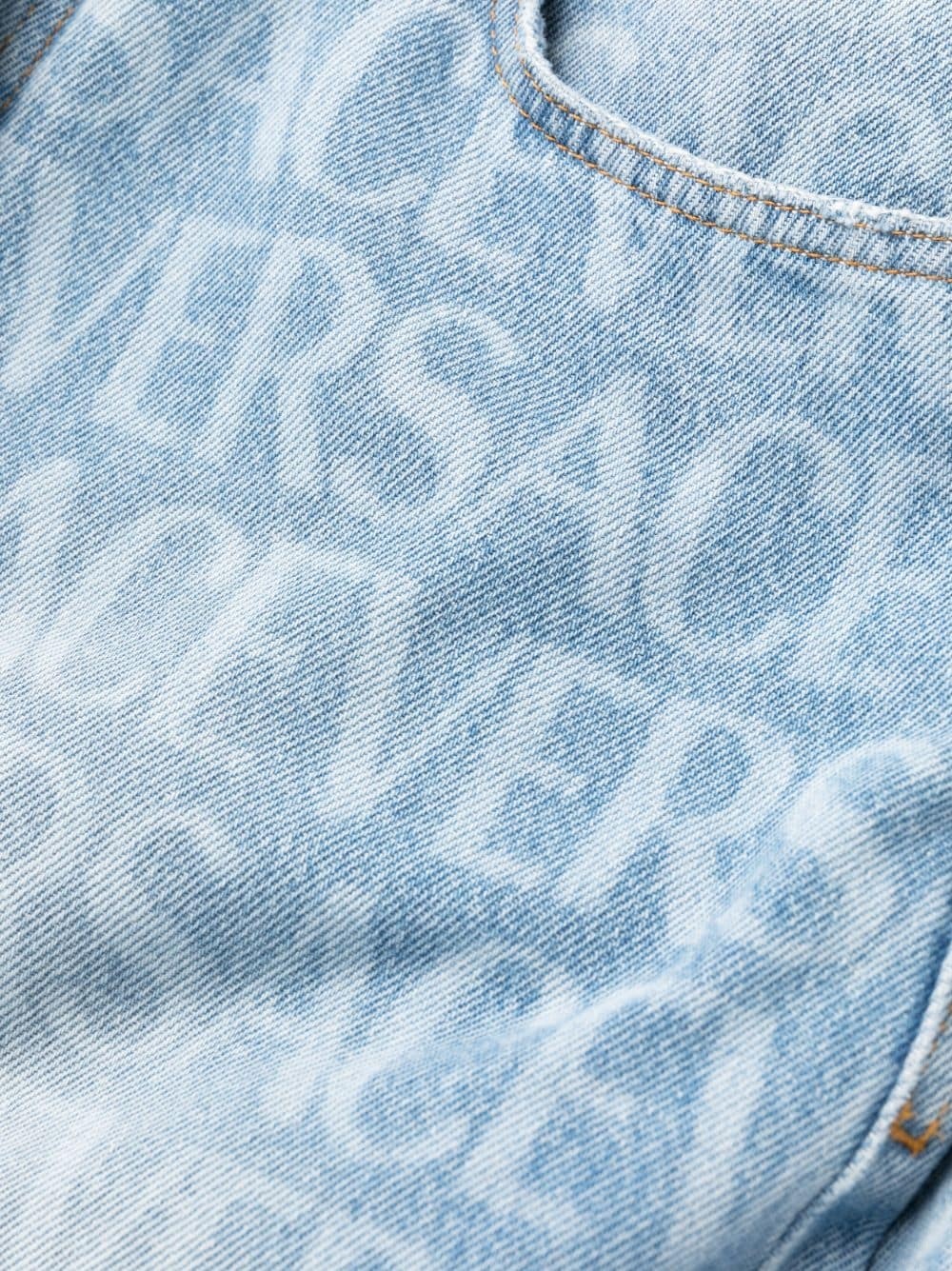 Allover logo-print jeans - 7