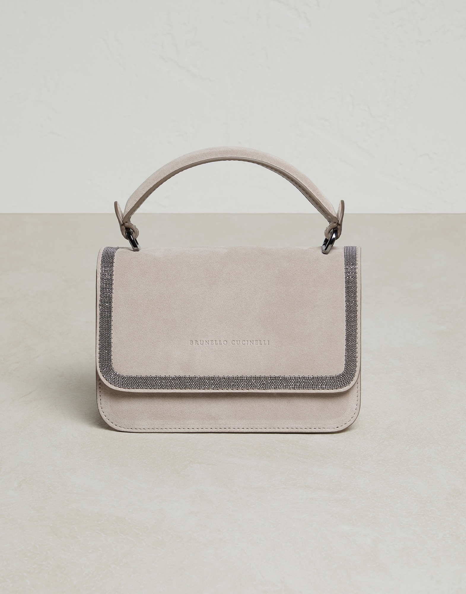 Suede bag with precious contour - 1