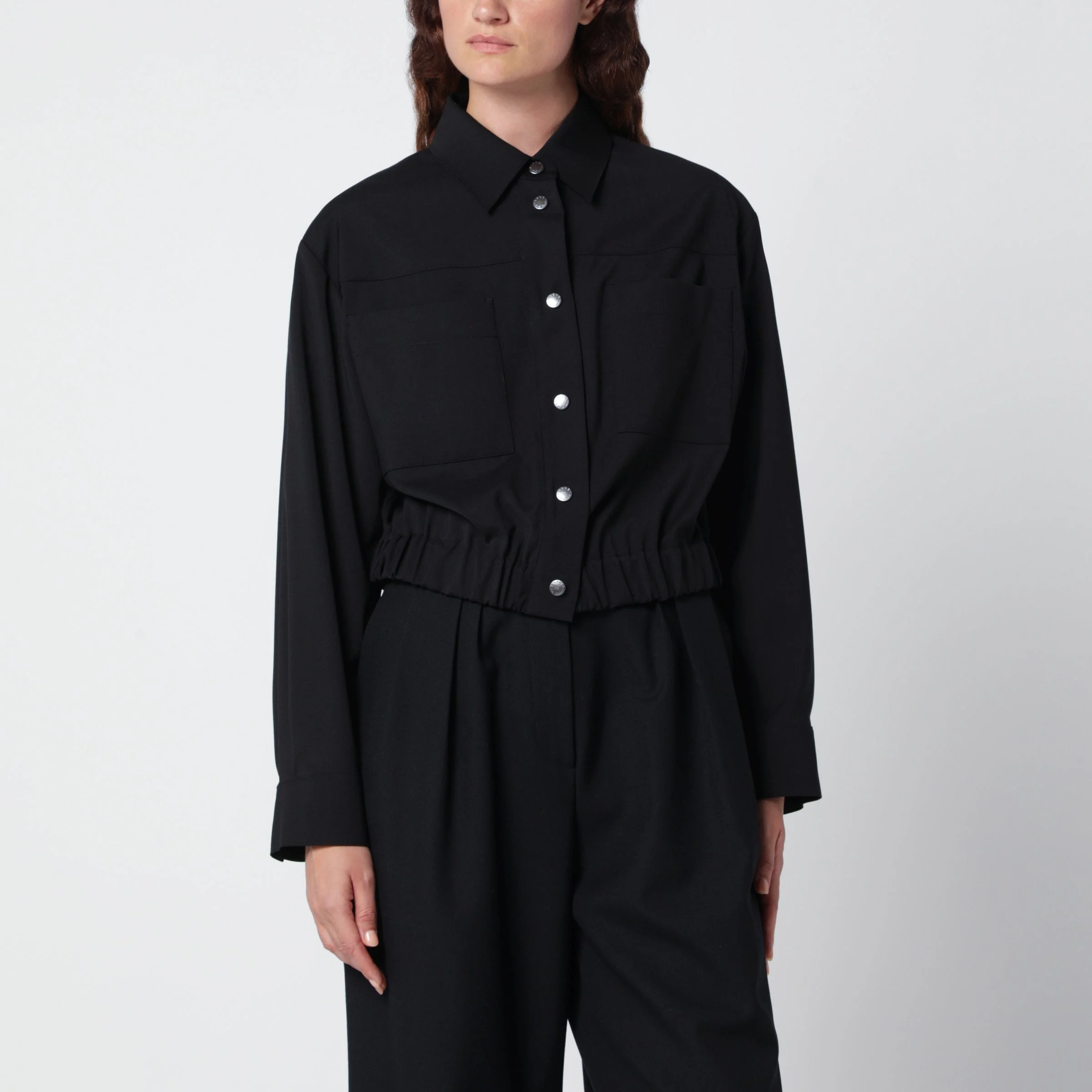 Short black jacket in virgin wool - 1