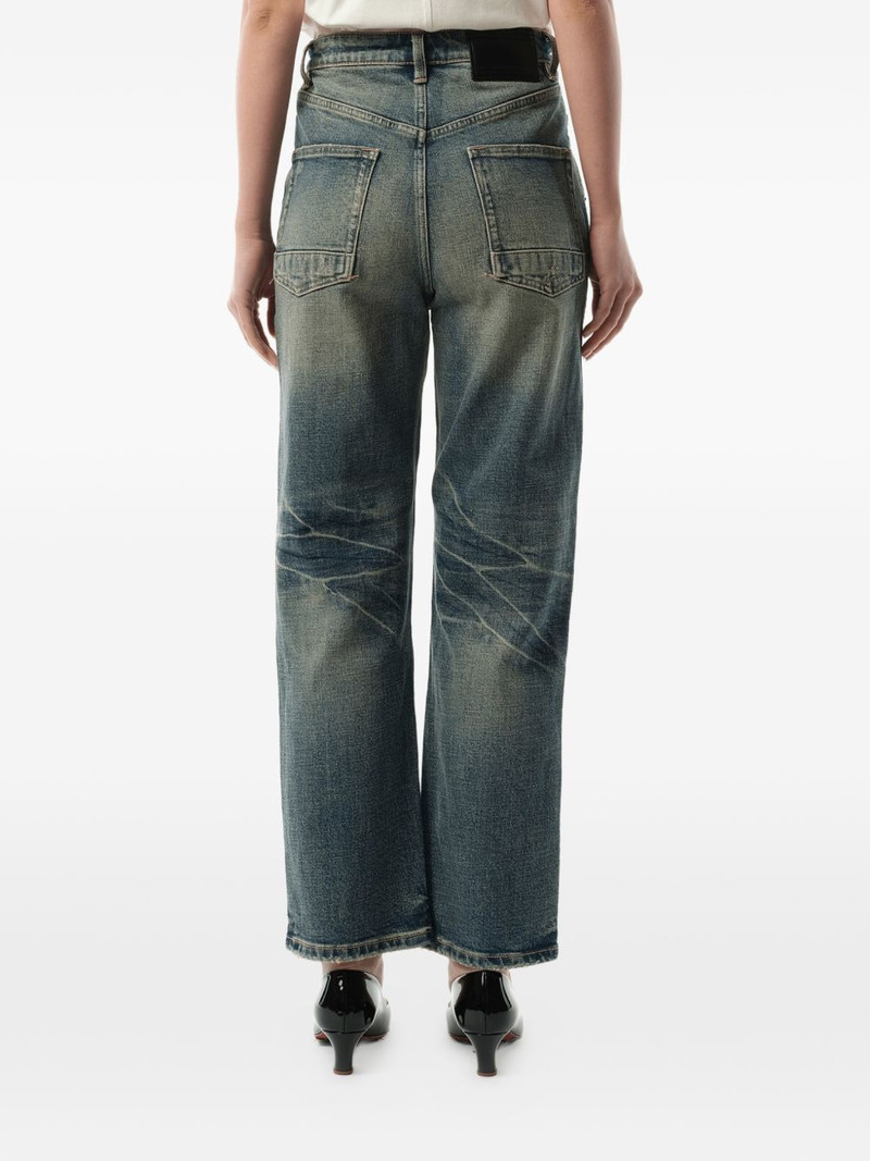 whiskering-effect jeans 5