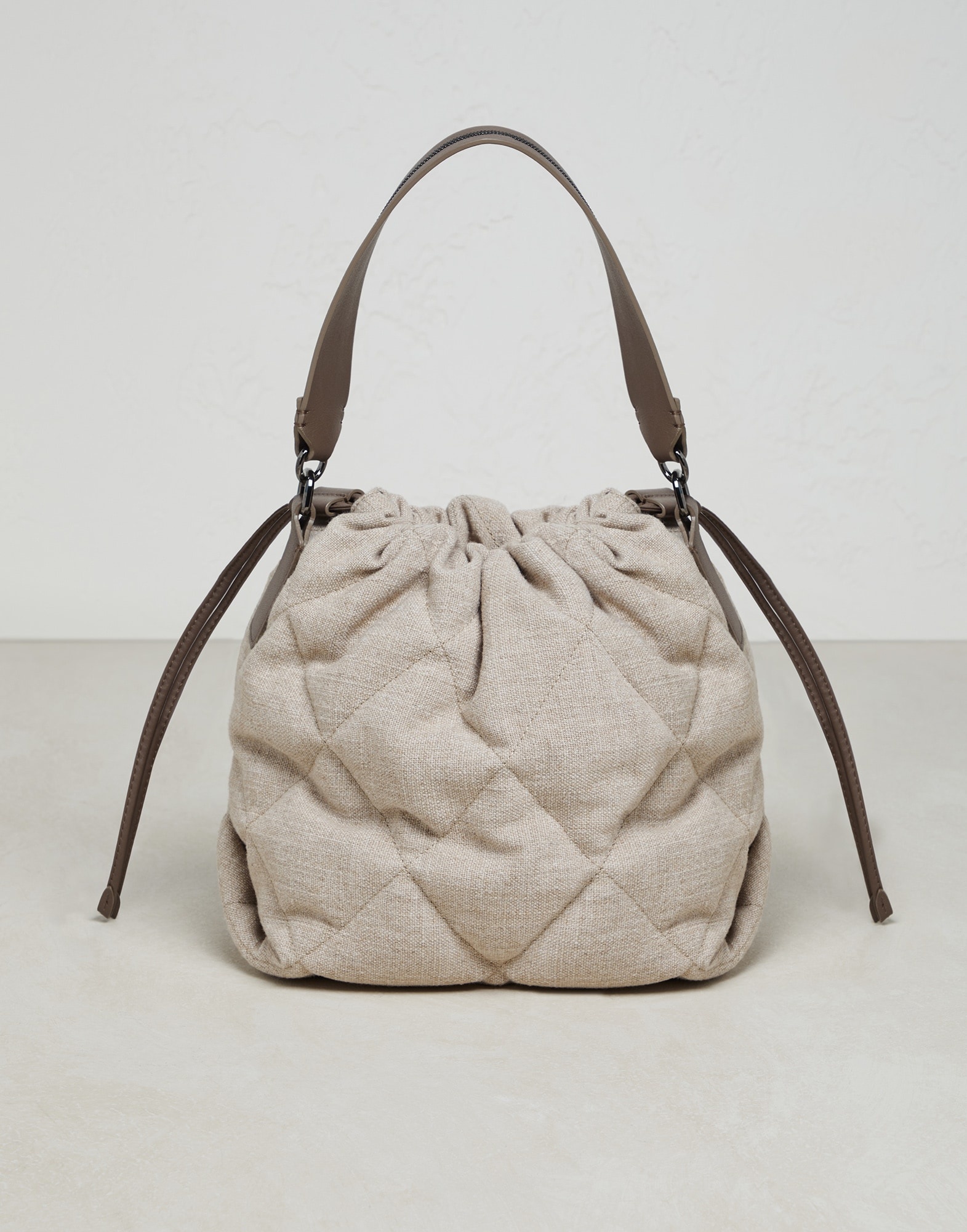 Quilted canvas bucket bag with shiny handle - 1