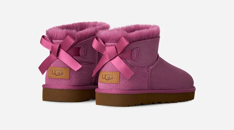 ® Women's Ultra Mini Bailey Bow Sheepskin Classic Boots in Dark Winterberry - 1