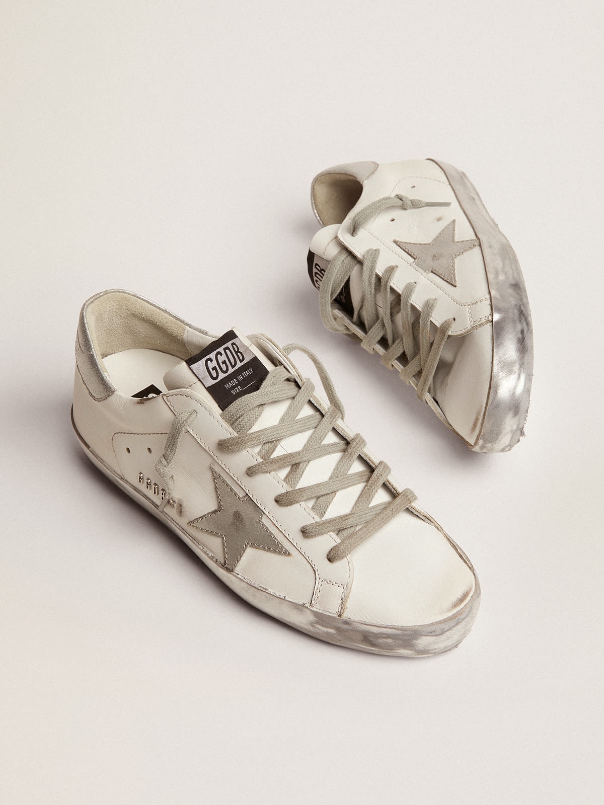 Golden Goose Super-Star sneakers with silver sparkle foxing and 