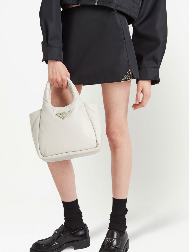 Prada triangle-logo mini skirt | farfetch | REVERSIBLE