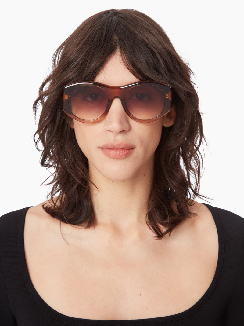 NINA RICCI Full Moon Round shiny transparent sunglasses outlook