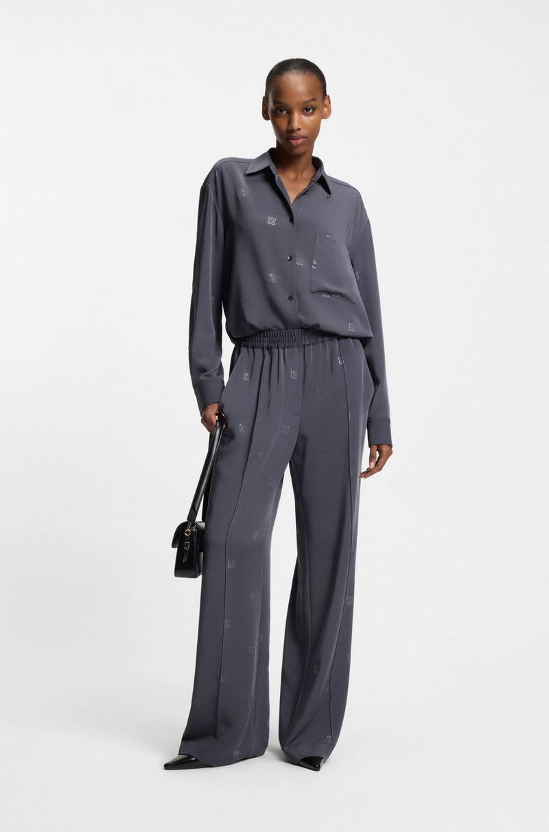 HUGO RELAXED-FIT TROUSERS WITH STACKED LOGOS outlook