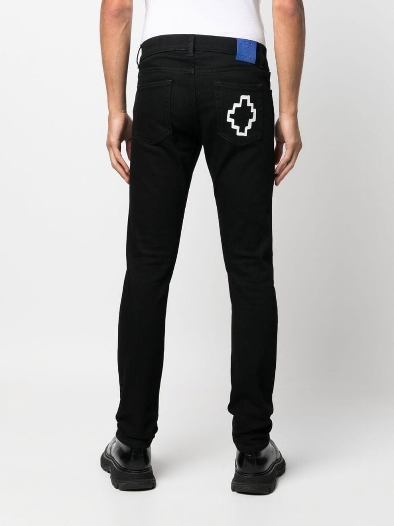 Tempera Cross logo-print slim-cut jeans - 4