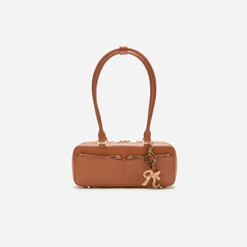 Tan Leather Baguette Shoulder Bag With Charm 1