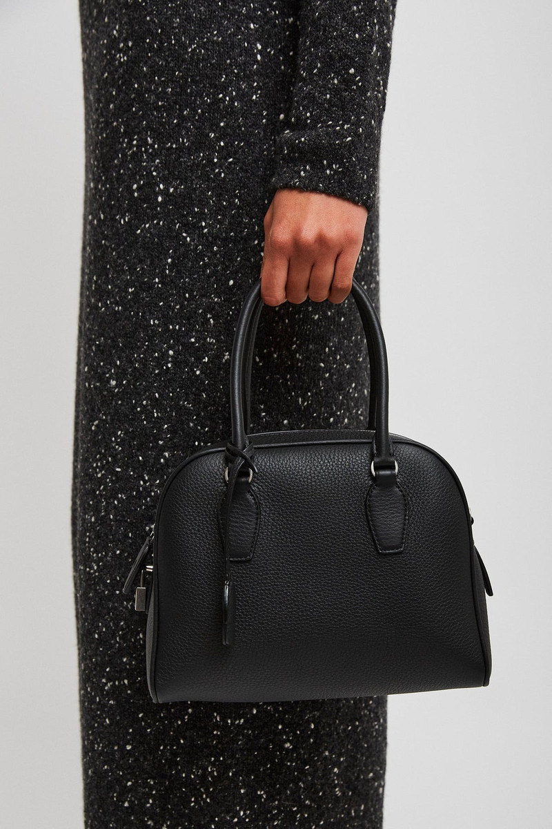 The Row India 10.00 black top handle bag outlook