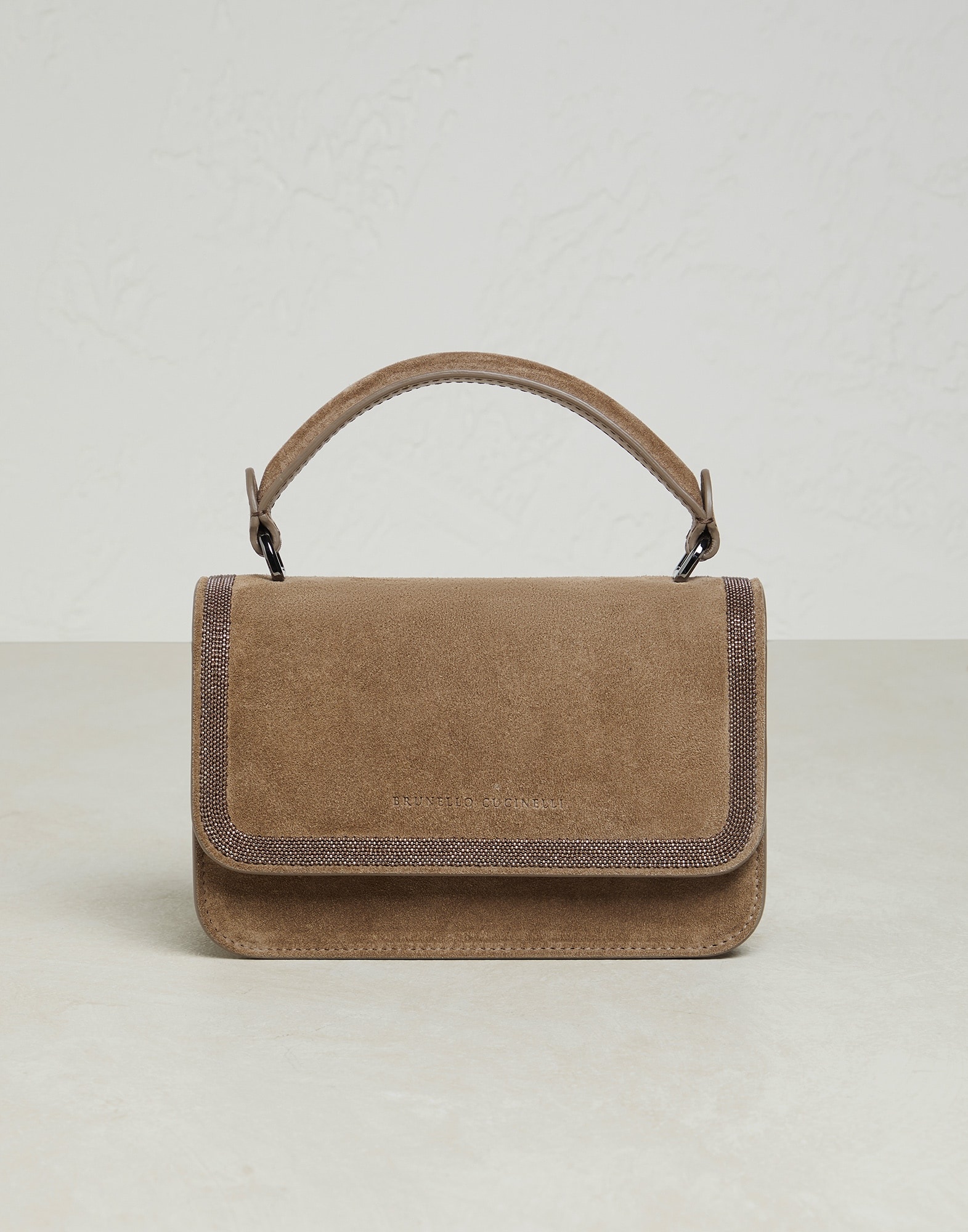 Suede bag with precious contour - 1