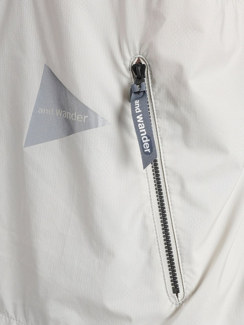 Pertex Quantum Air logo-print zip-pocket T-shirt 5