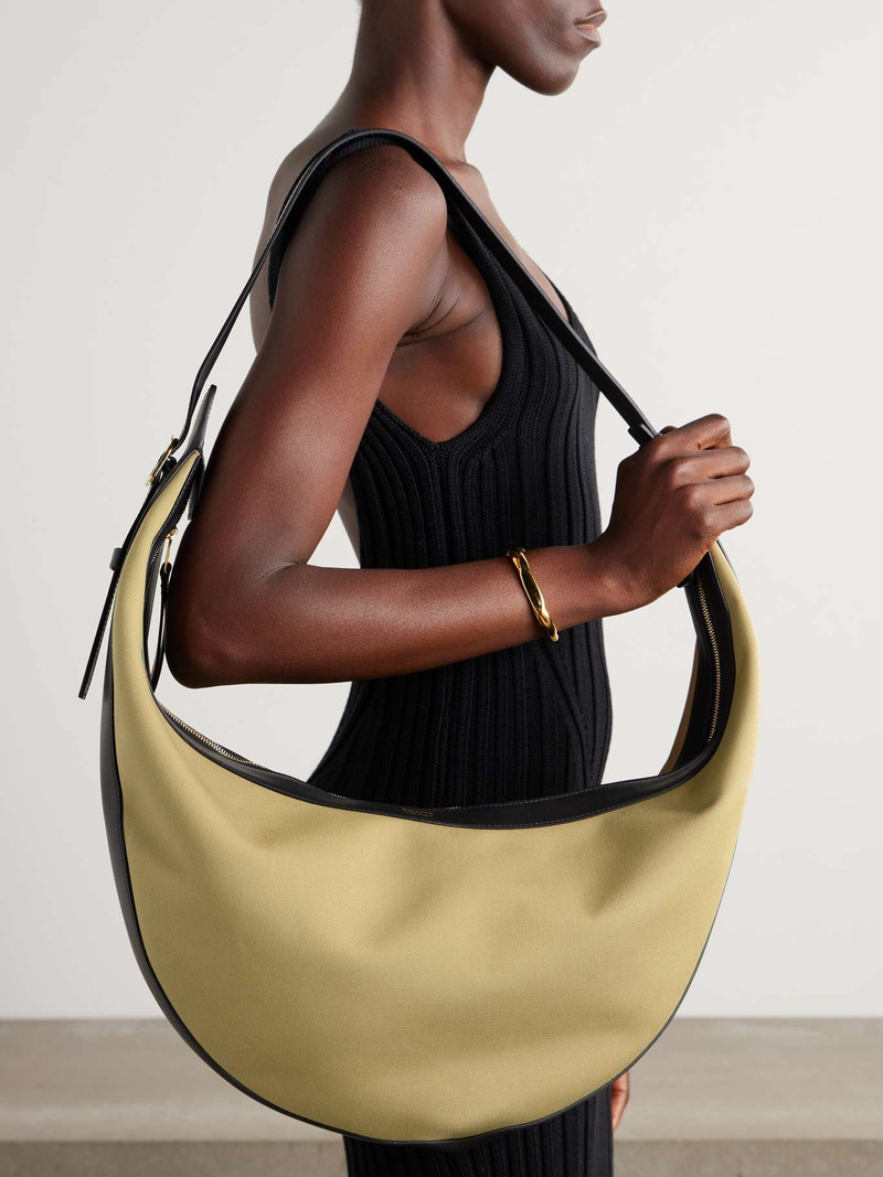 KHAITE Augustina leather-trimmed canvas shoulder bag outlook