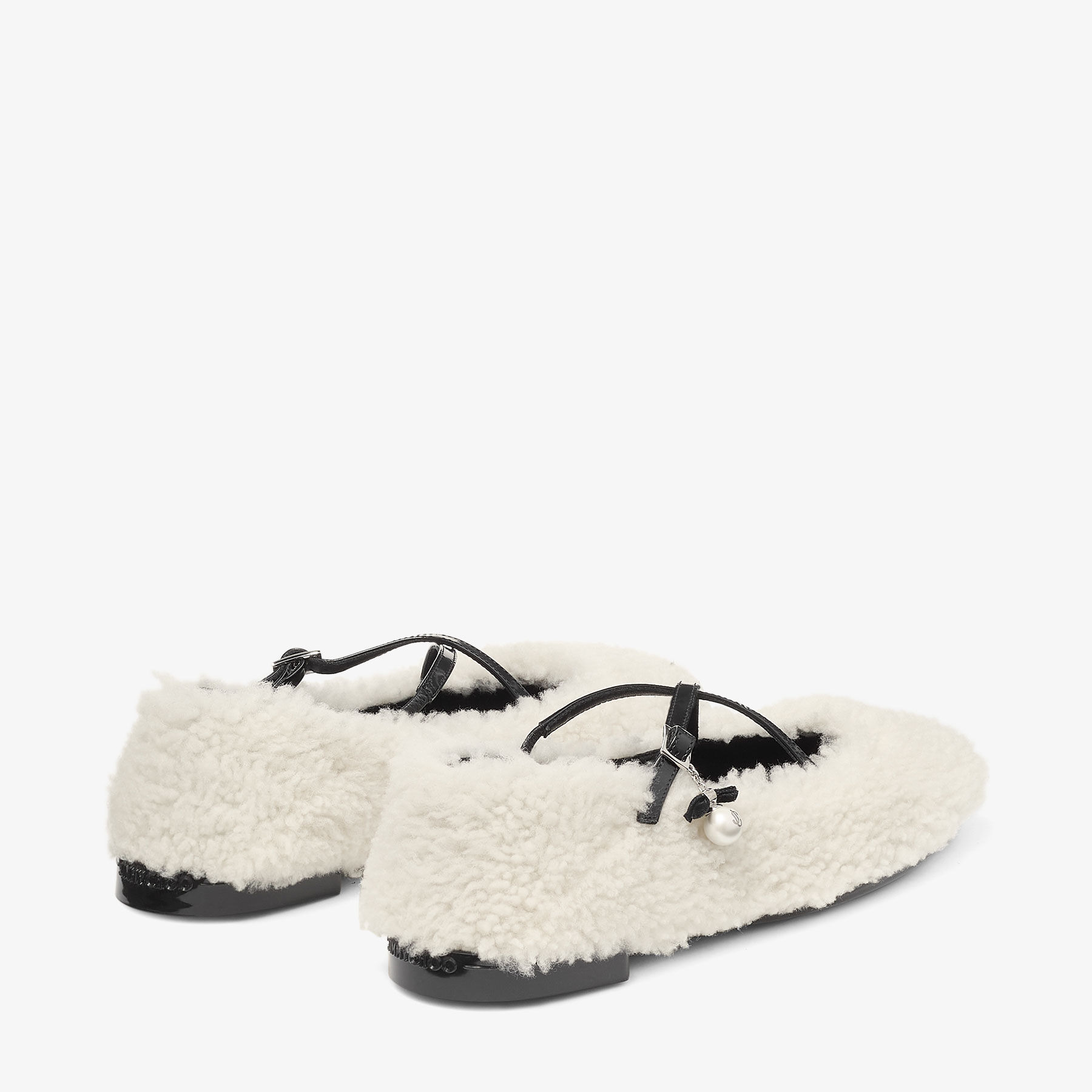 Eleri Ballerina S
Natural Shearling Ballerina Pumps with Pearl Charm - 5