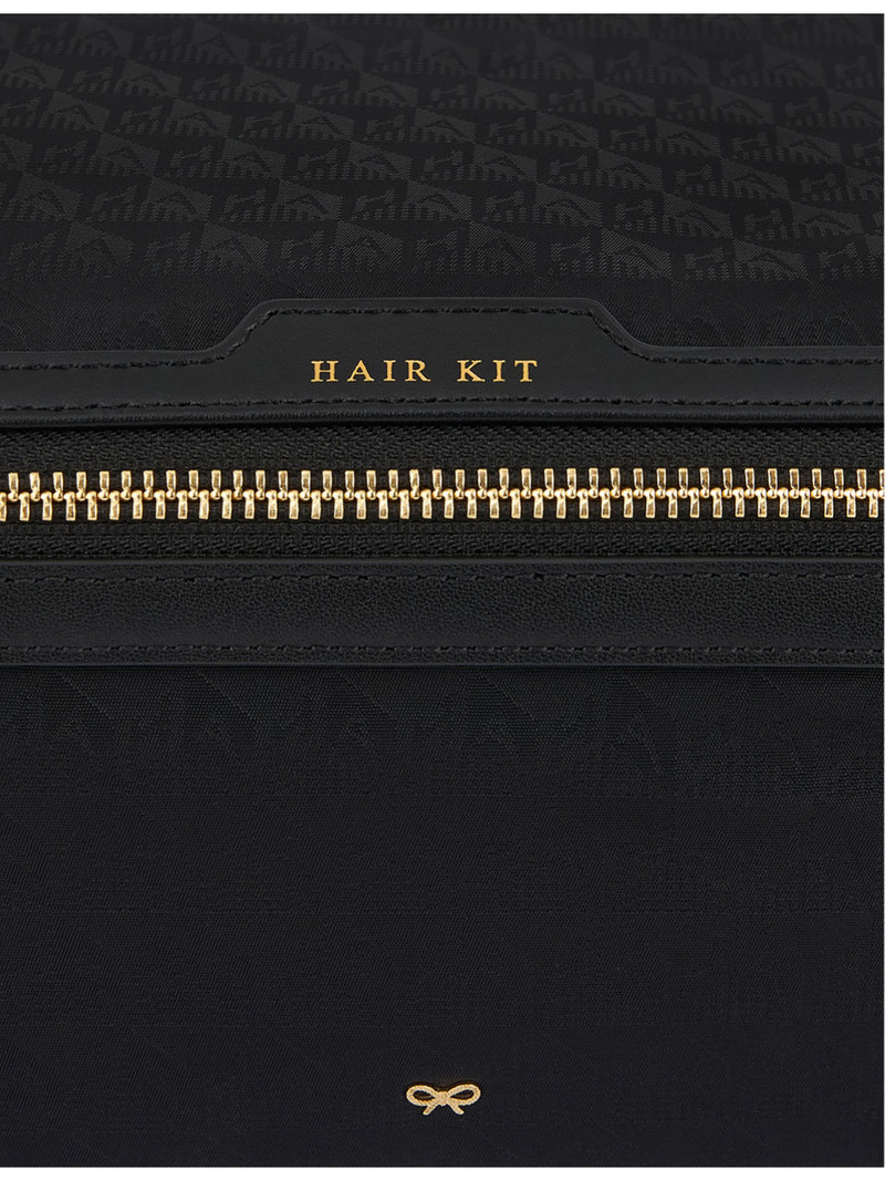Anya Hindmarch Hair Kit logo-embossed recycled-nylon travel pouch outlook