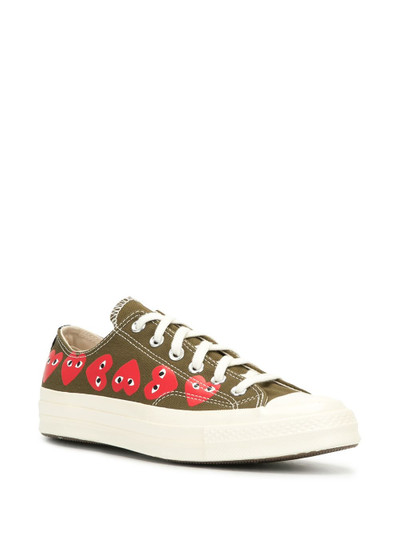 Comme Des Garçons signature red heart print sneakers outlook