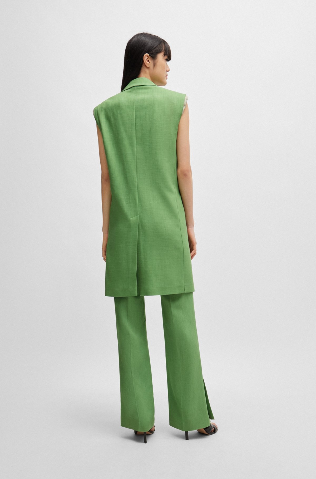 SLEEVELESS JACKET WITH CONCEALED CLOSURE AND SIGNATURE LINING - 4