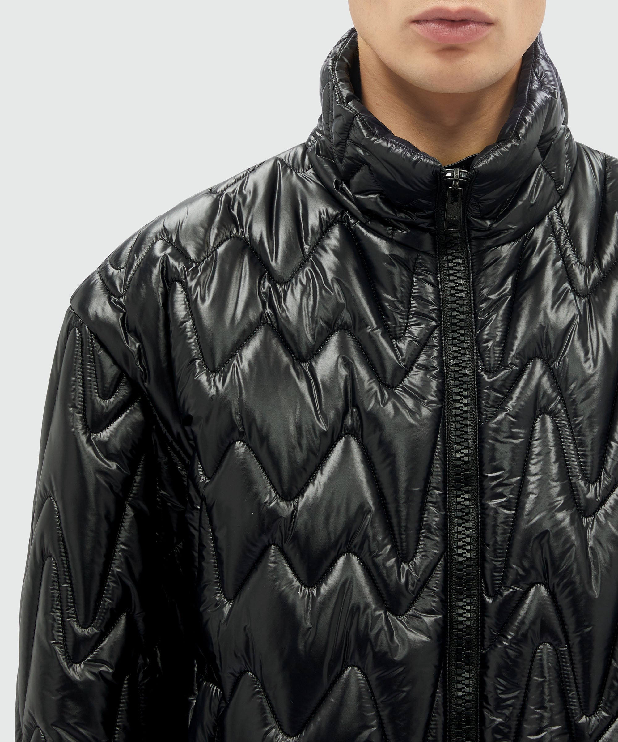 Black quilted jacket with "TheMwave" motif - 5