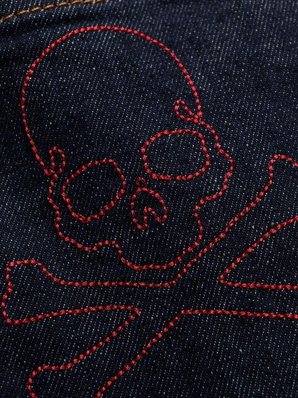 skull-embroidered skinny jeans - 7