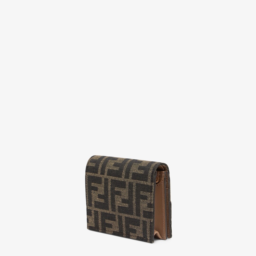 Small Baguette bi-fold wallet. Interior organized with flat pockets, a coin pocket with zip, four ca - 2