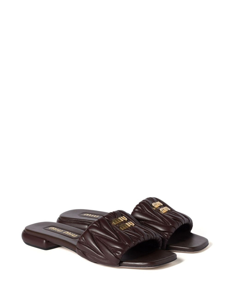 Miu Miu matelassé leather slides outlook