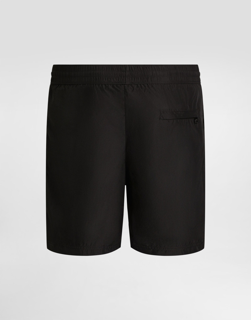 Dolce & Gabbana Mid-length swim trunks with logo tag outlook