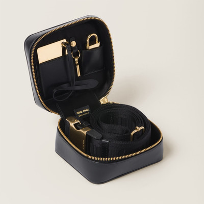Miu Miu Luggage accessories with leather case outlook
