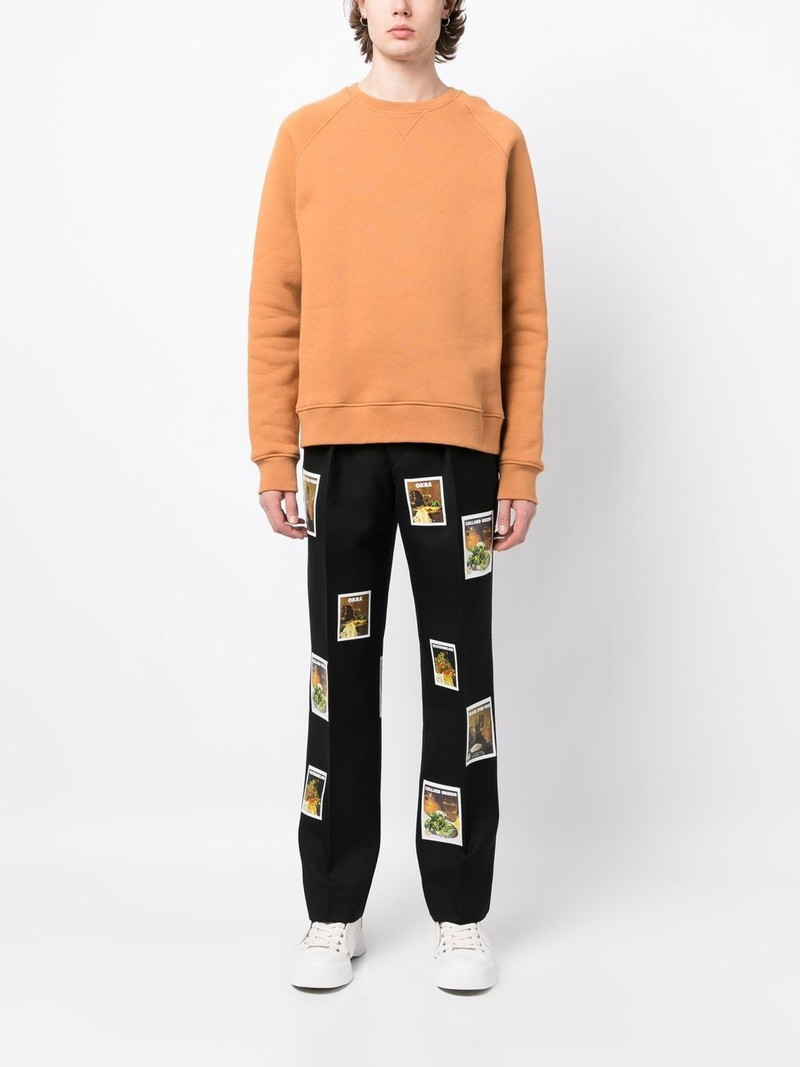 DENIM TEARS wool polaroid print trousers outlook