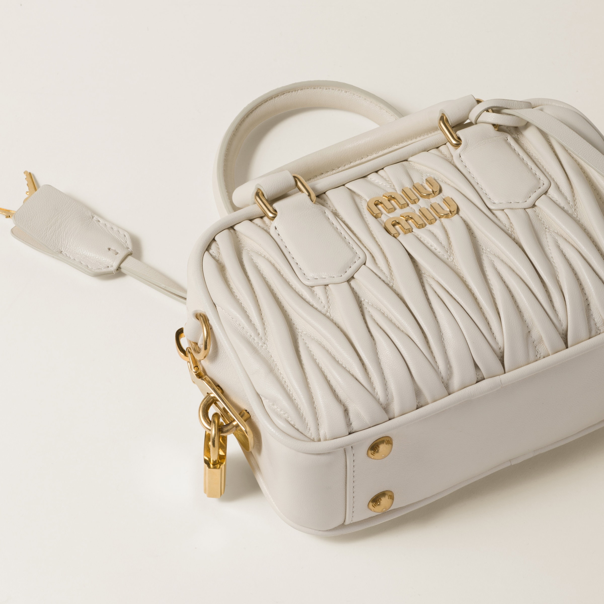 Miu Miu Matelassé nappa leather top-handle bag | REVERSIBLE 