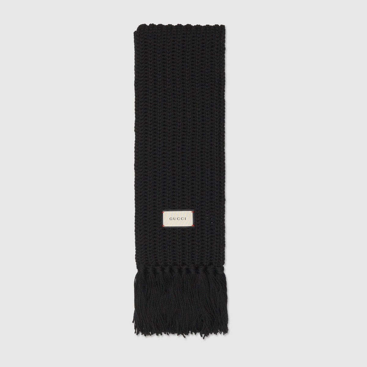 Knit wool scarf with Gucci label - 1