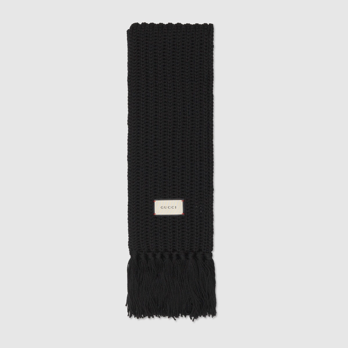 Knit wool scarf with Gucci label - 1