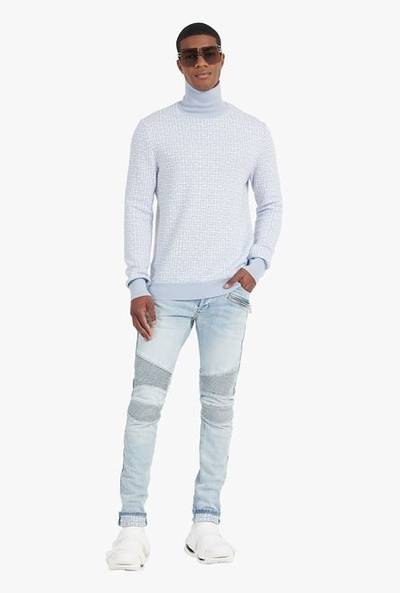 Balmain Slim cut faded and ridged light blue denim cotton jeans with Balmain monogram on hem outlook