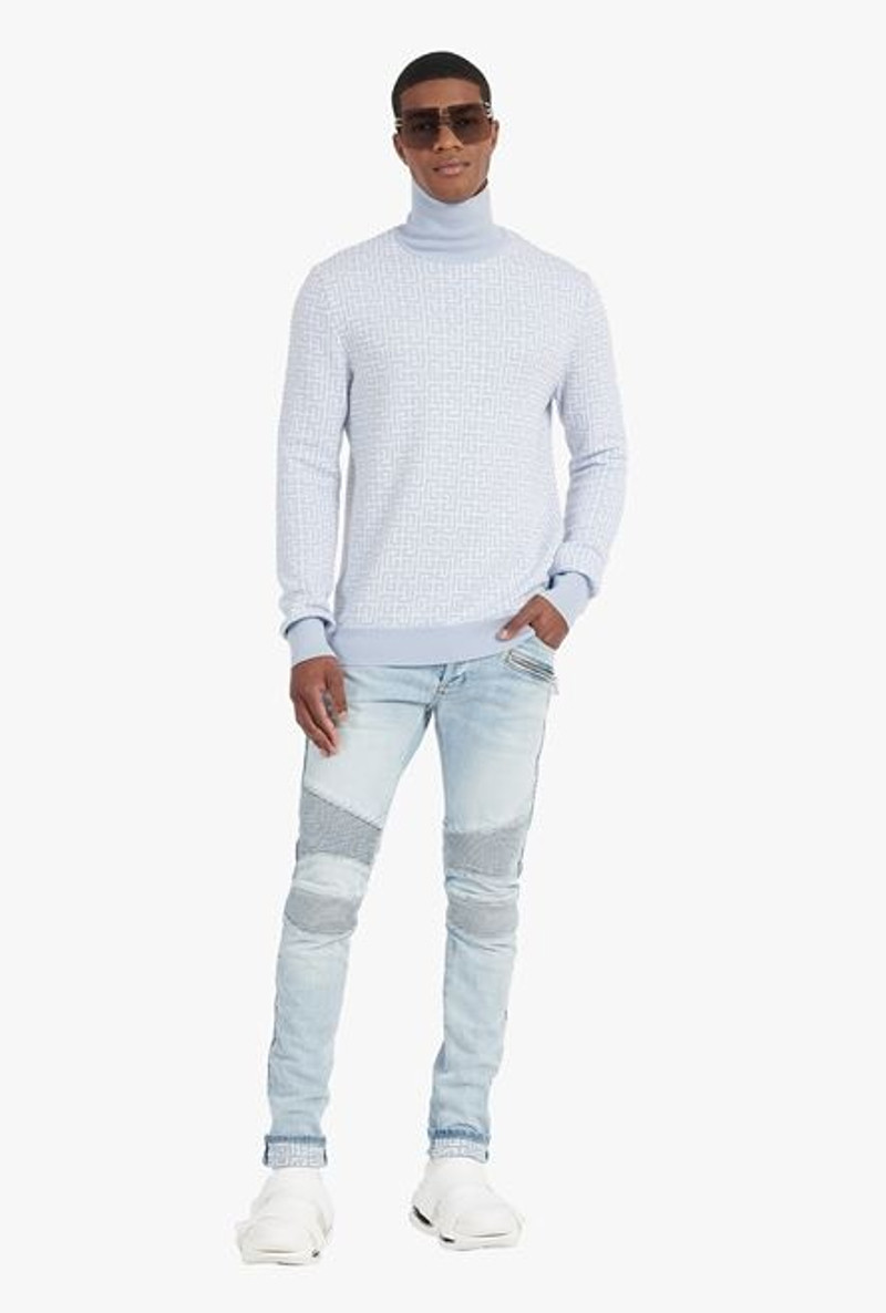 Balmain Slim cut faded and ridged light blue denim cotton jeans with Balmain monogram on hem outlook
