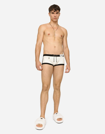 Dolce & Gabbana High-legged swim trunks with patch outlook