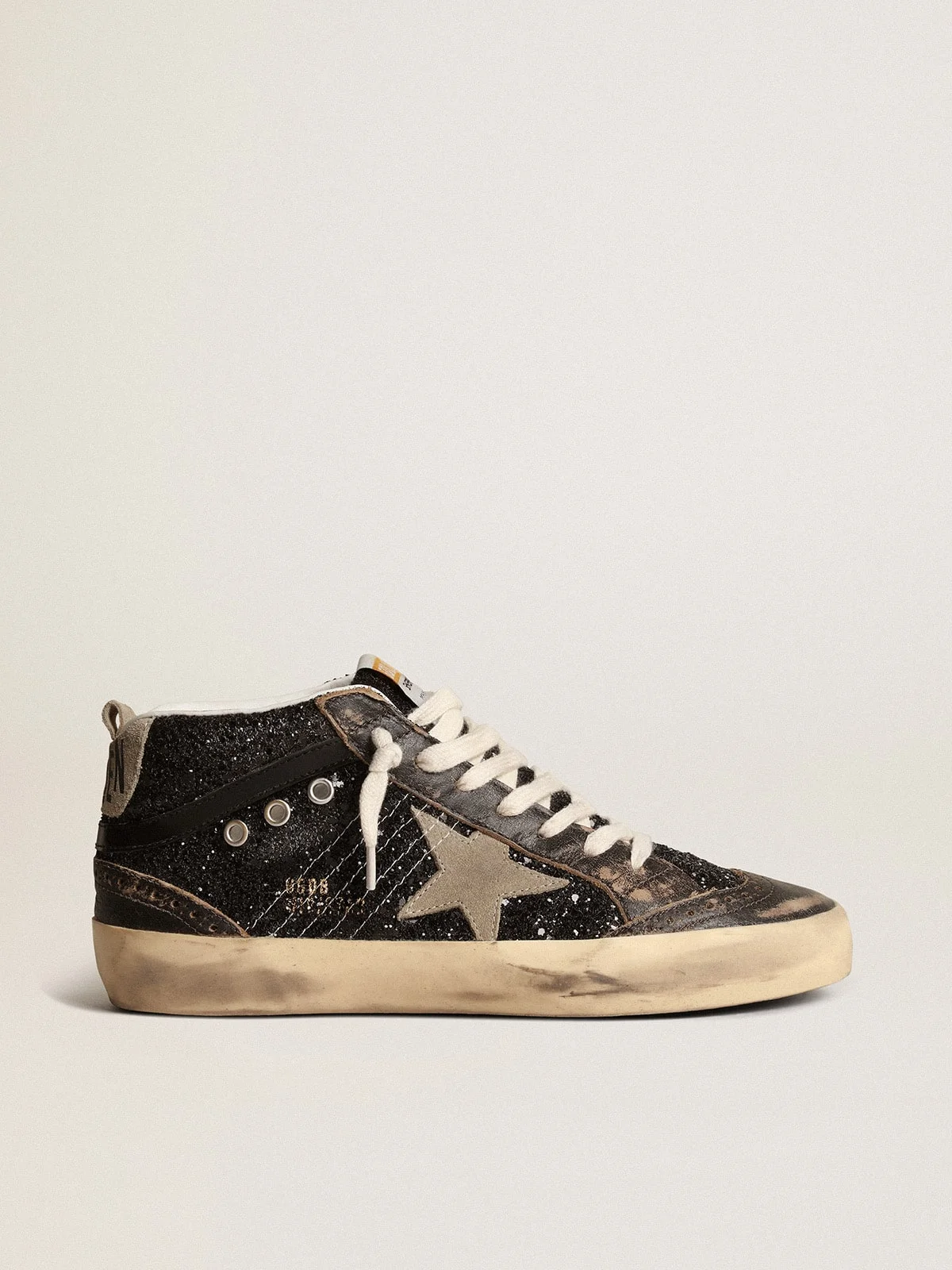 Mid Star in black glitter with dove-gray suede star and heel tab - 1