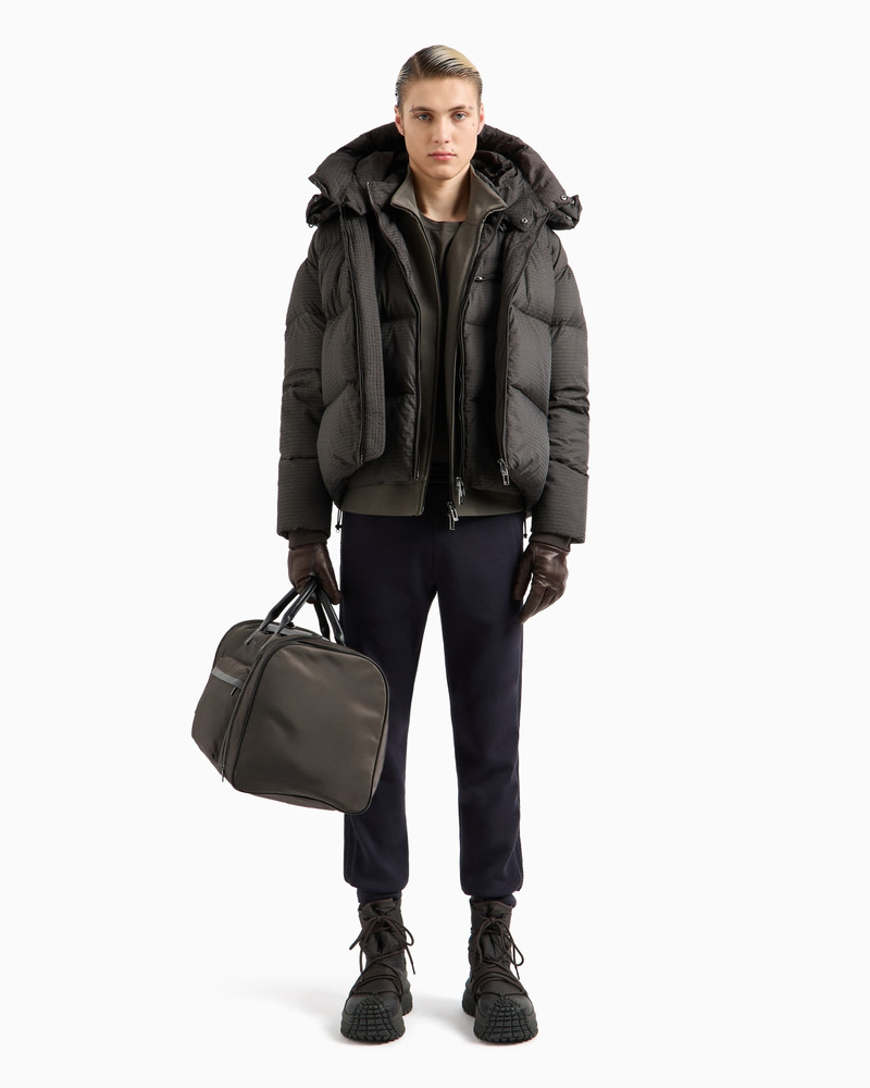 EMPORIO ARMANI Zipped, hooded sleeveless down jacket in jacquard nylon with all-over logo lettering outlook