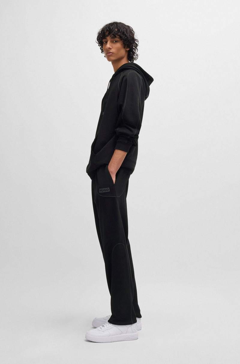 HUGO COTTON-TERRY TRACKSUIT BOTTOMS WITH DECORATIVE REFLECTIVE TRIMS outlook