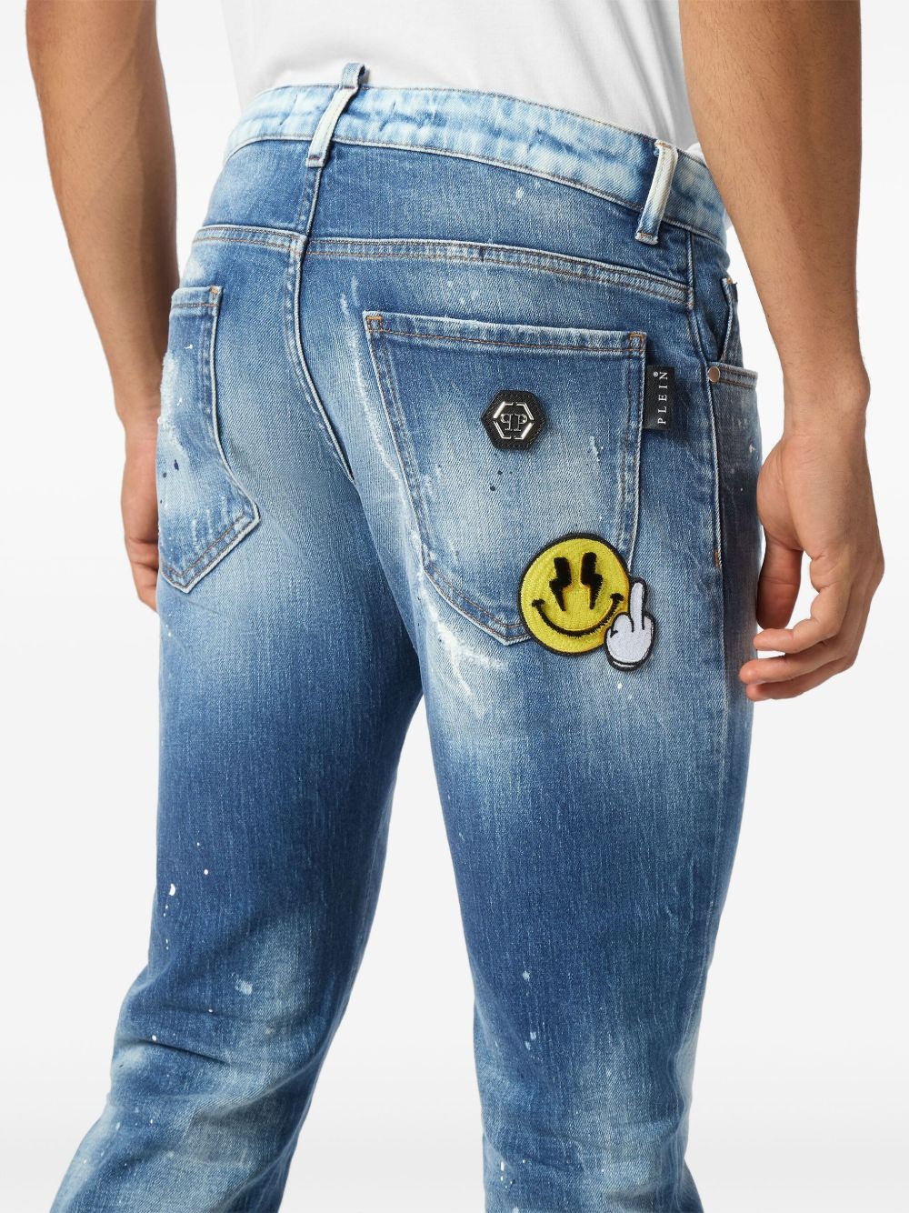 smiley face-appliqué jeans - 4