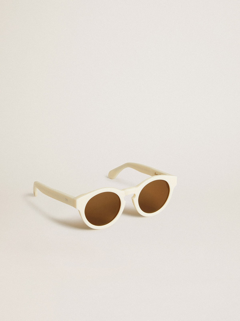 Square-style Panthos sunglasses with beige frame and gold details 1