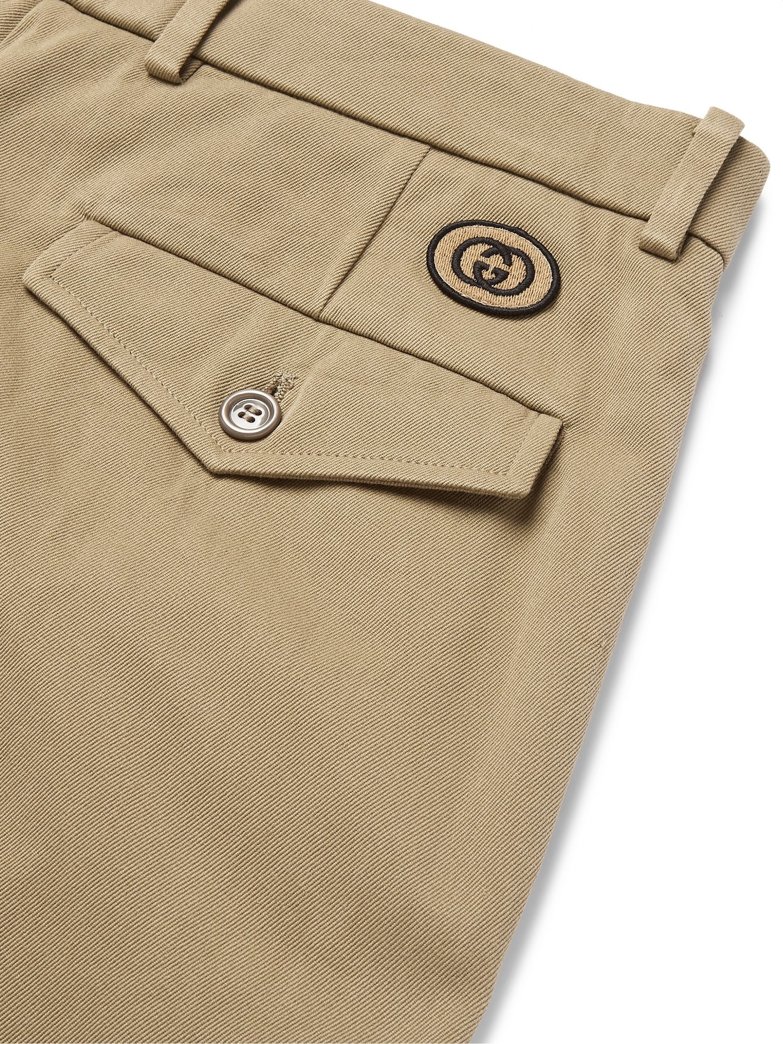 Tapered Logo-Appliquéd Pleated Cotton-Gabardine Trousers - 5