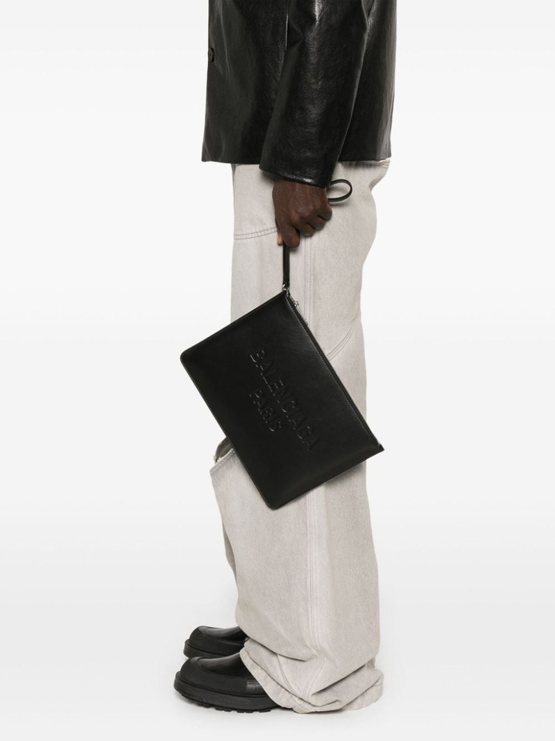 BALENCIAGA logo-debossed clutch bag outlook