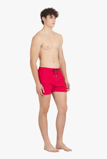 Red swim trunks with transparent Balmain logo print - 7